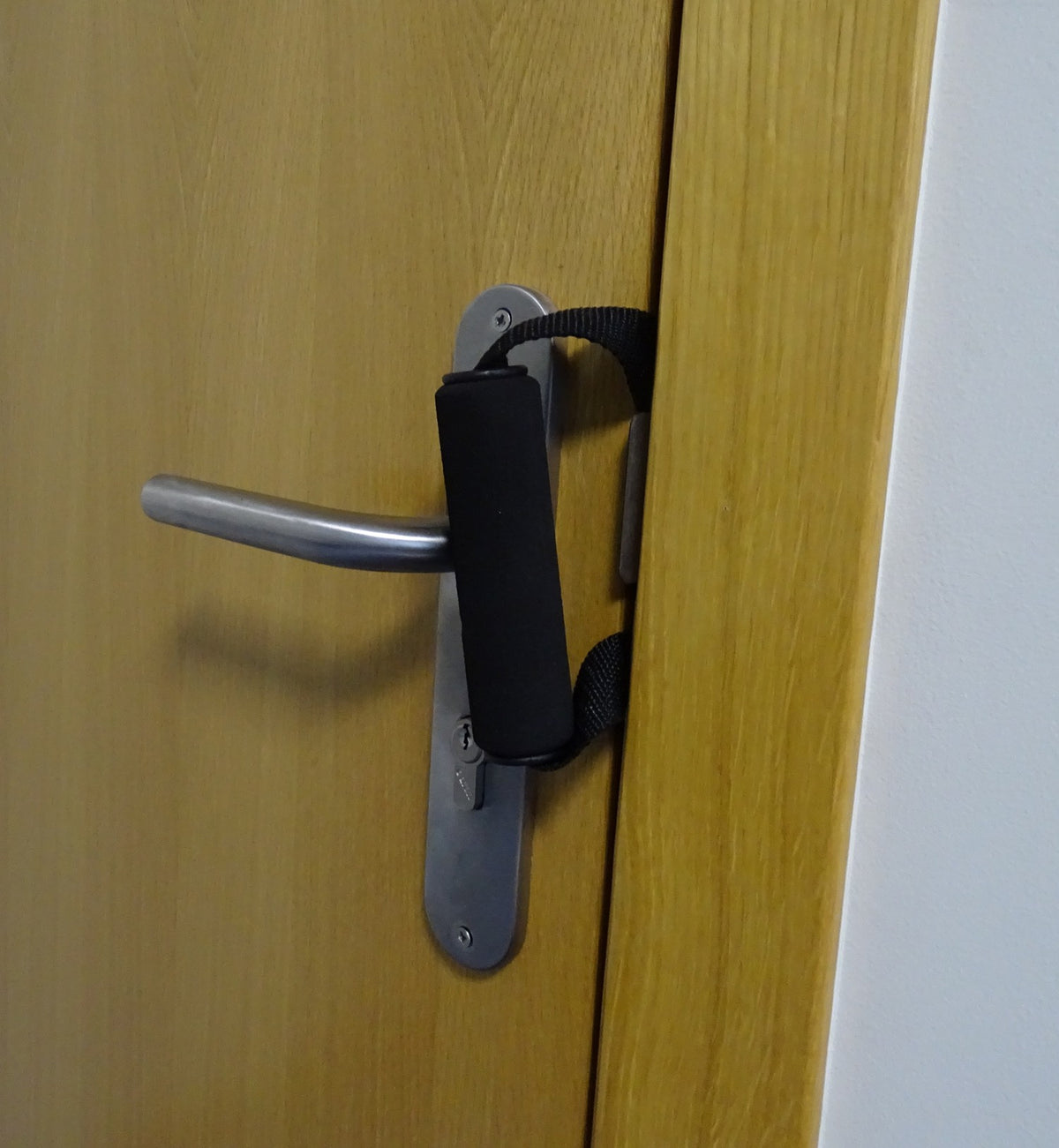 Accesorio para la práctica de ejercicios con brazo, con adaptador para puertas.