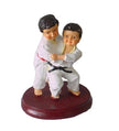 Figura de judokas en posición O-Goshi